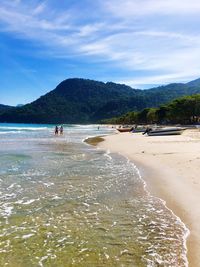 Scenic view of beach against sky