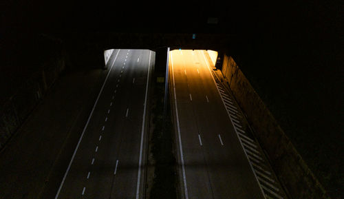 High angle view of illuminated road at night