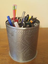 Close-up of desk organizer on table