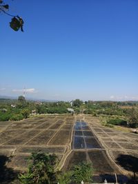 Scenic view of landscape against clear blue sky