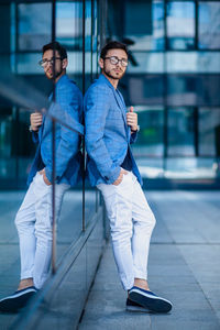 Portrait of young man standing outdoors