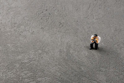 High angle view of toy on sand at beach