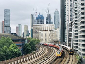 High angle view of railroad tracks amidst buildings in city of london.