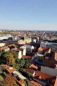 High angle shot of townscape against clear sky