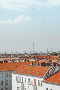 High angle view of cityscape against sky during sunny day