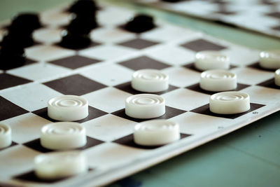 Close-up of chess pieces on table