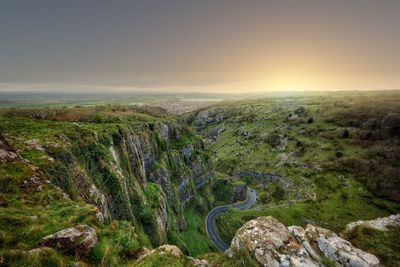 Scenic view of landscape against sky during sunset