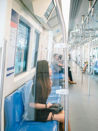 City life concept from asian woman use public skytrain.