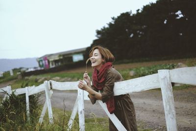 Portrait of smiling young woman