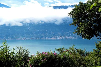 Scenic view of mountains against cloudy sky