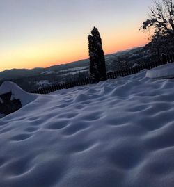 Scenic view of landscape against sky during sunset