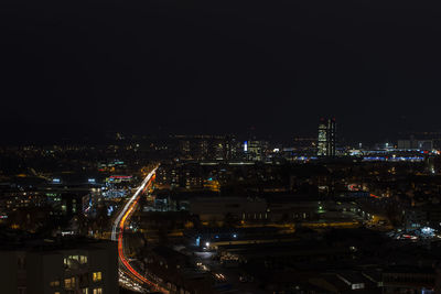 Illuminated cityscape at night