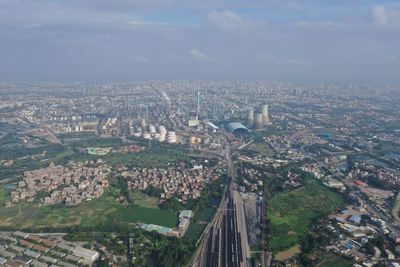 High angle view of buildings in city against sky