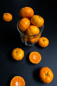 High angle view of orange fruits in bowl