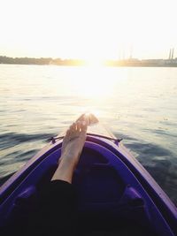 Cropped image of boat sailing in sea