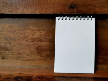 High angle view of paper on table