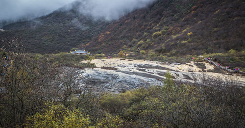 High angle view of river amidst mountains