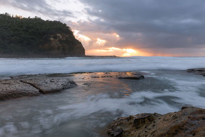 Scenic view of sea against sky during sunset