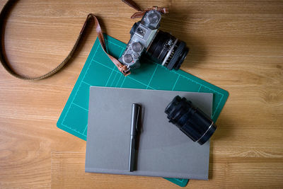 High angle view of drawing on paper on table