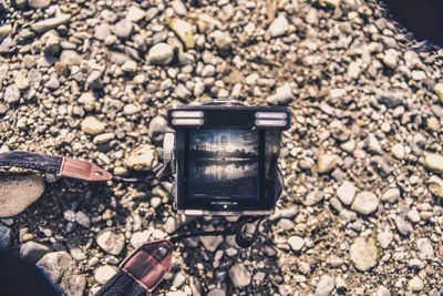 Directly above shot of camera on stones