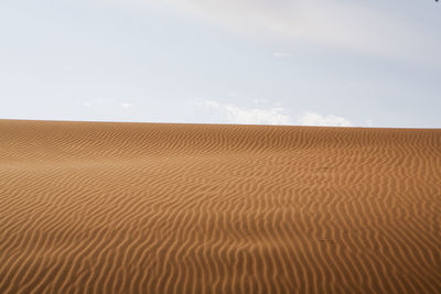 Scenic view of desert against sky