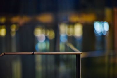 Close-up of railing against blurred background