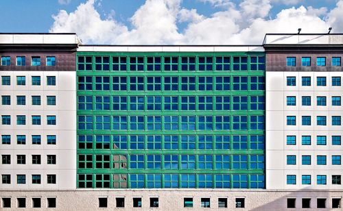 Low angle view of modern building against sky