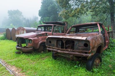 Abandoned truck on field