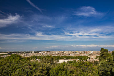 Panoramic view of city and buildings against sky