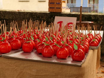 Close-up of taffy apples for sale on table