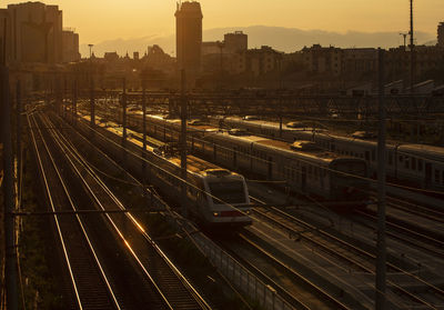 High angle view of railroad tracks at sunset