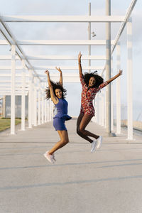 Full length of woman jumping