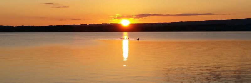Scenic view of sunset over sea