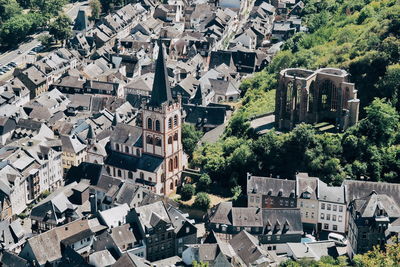 High angle view of houses and trees in town