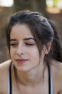 Close-up portrait of young woman