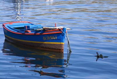 Boats in calm lake