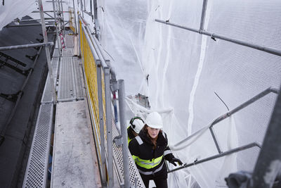 Engineer walking at building site