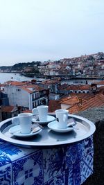 View of coffee with cityscape in background