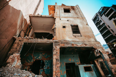 Low angle view of damaged building