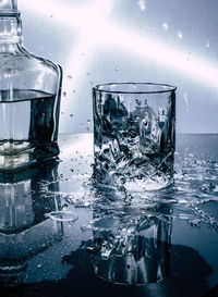 Close-up of glass splashing in water