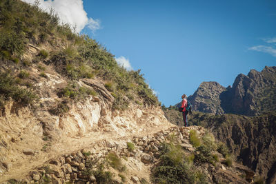 Low angle view of rock formations against sky