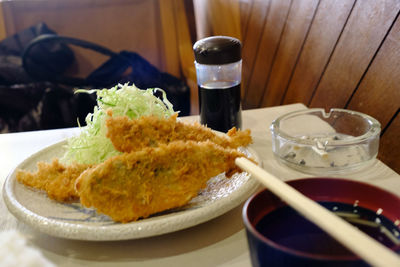 Close-up of food served on table