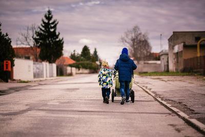 Woman walking on road