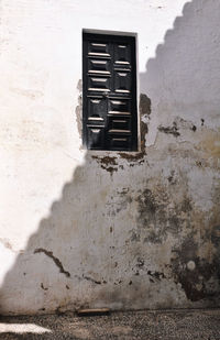 Shadow of old abandoned building