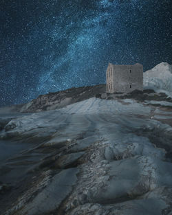 Scenic view of sea against sky at night