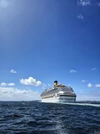 Scenic view of sea against blue sky