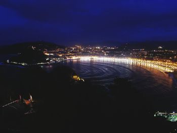 Illuminated cityscape at night