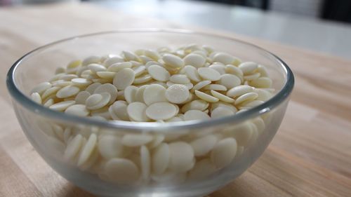 High angle view of chopped coffee in bowl on table