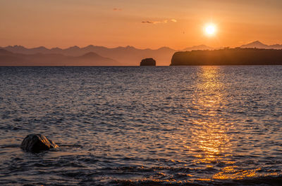 Scenic view of sea against sky during sunset