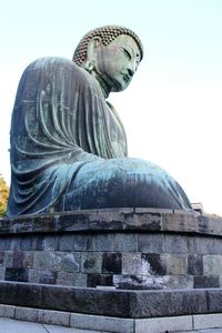 Low angle view of statue against clear sky